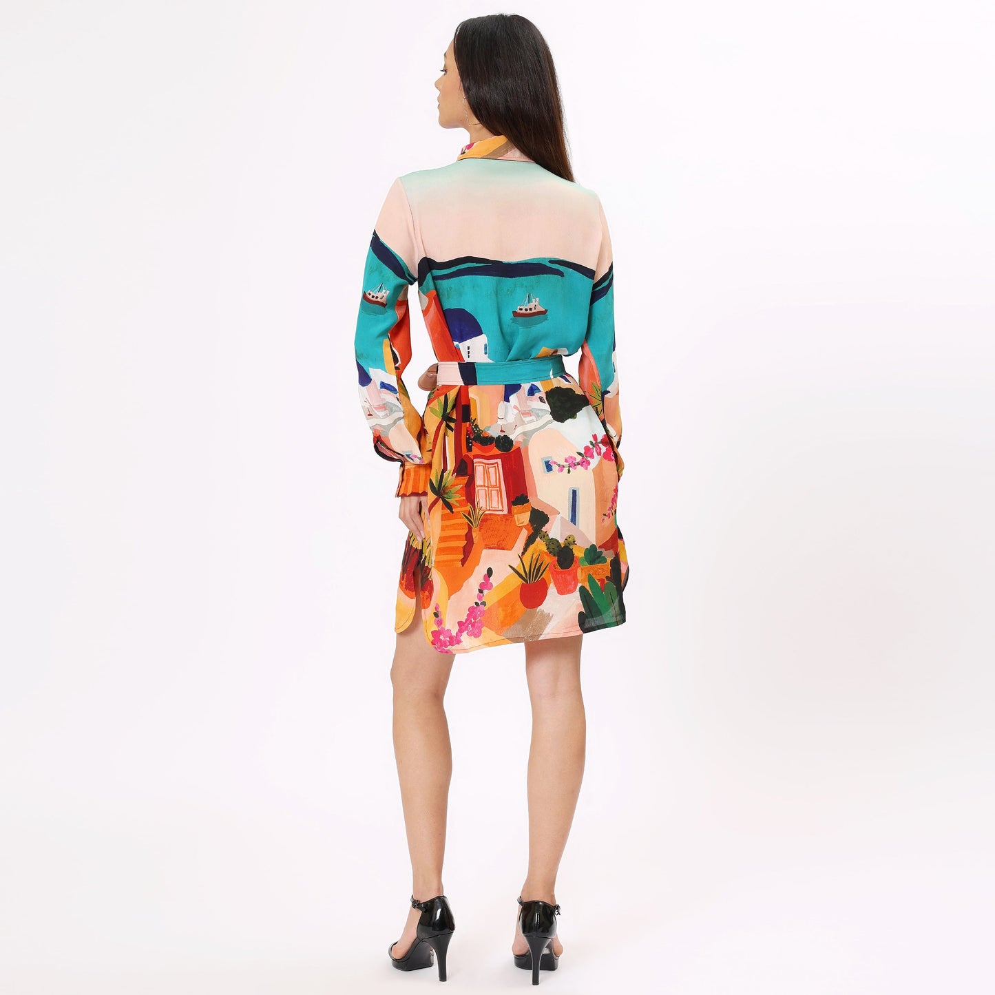 Back view of a colorful shirt dress for women featuring a vibrant graphic design by Stylera 