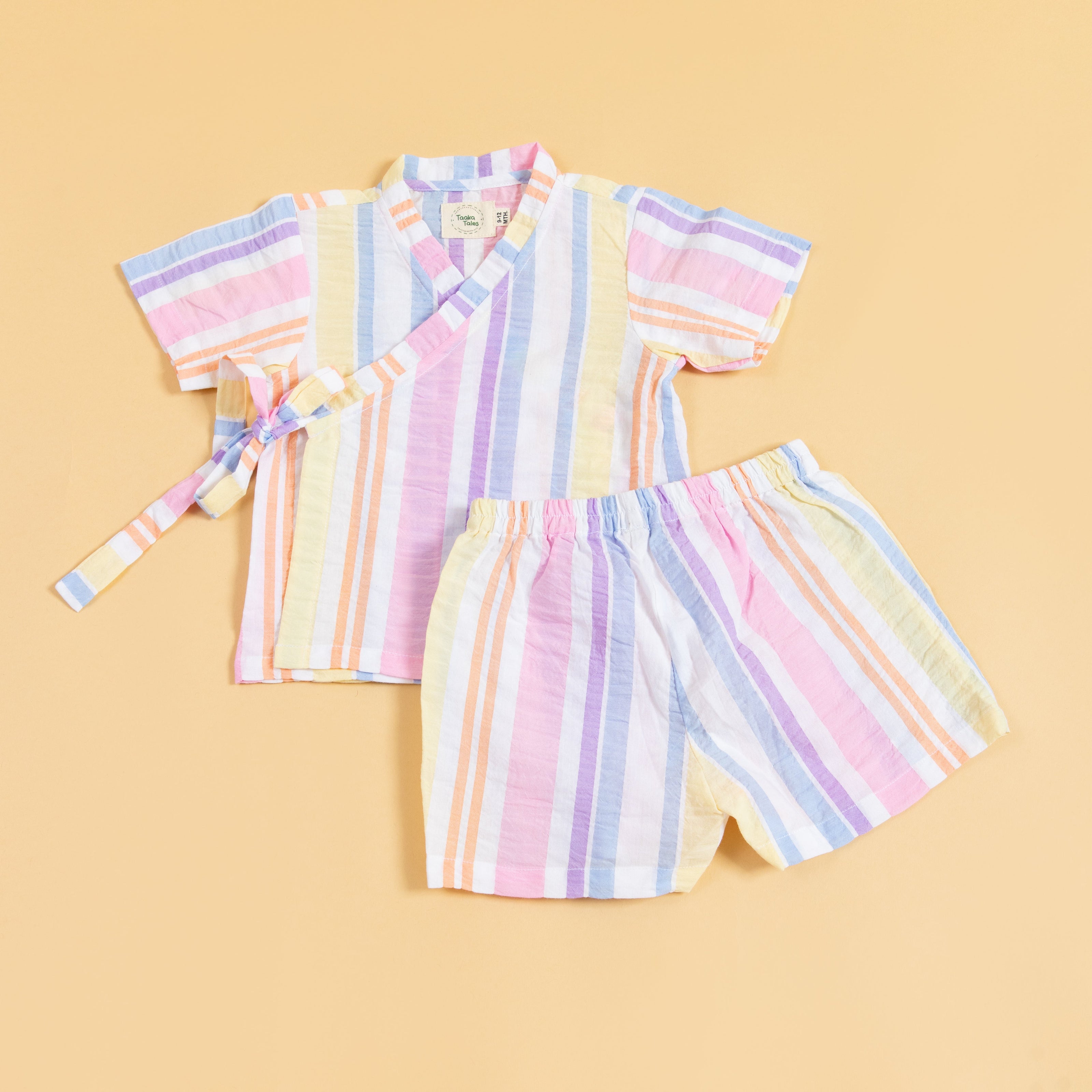 Colorful summer kimono outfit with pastel striped short-sleeve top and matching shorts for kids