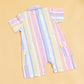 Colorful summer playsuit by Stylera with a striped design and easy snap closure