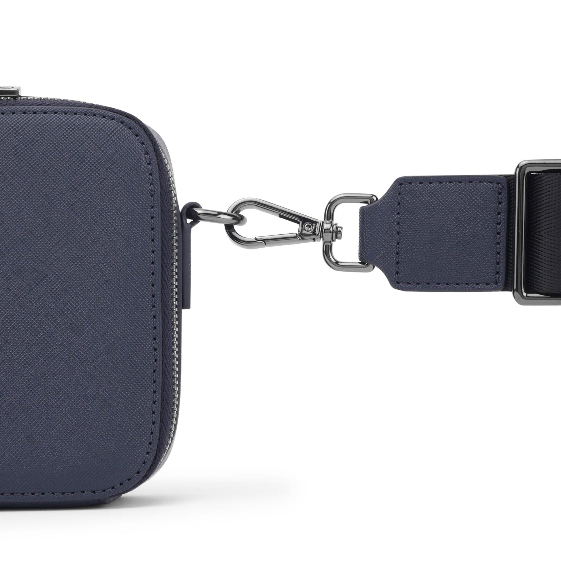 Stylera compact blue shoulder purse closeup showing textured square bag with silver swivel clasp and detachable strap