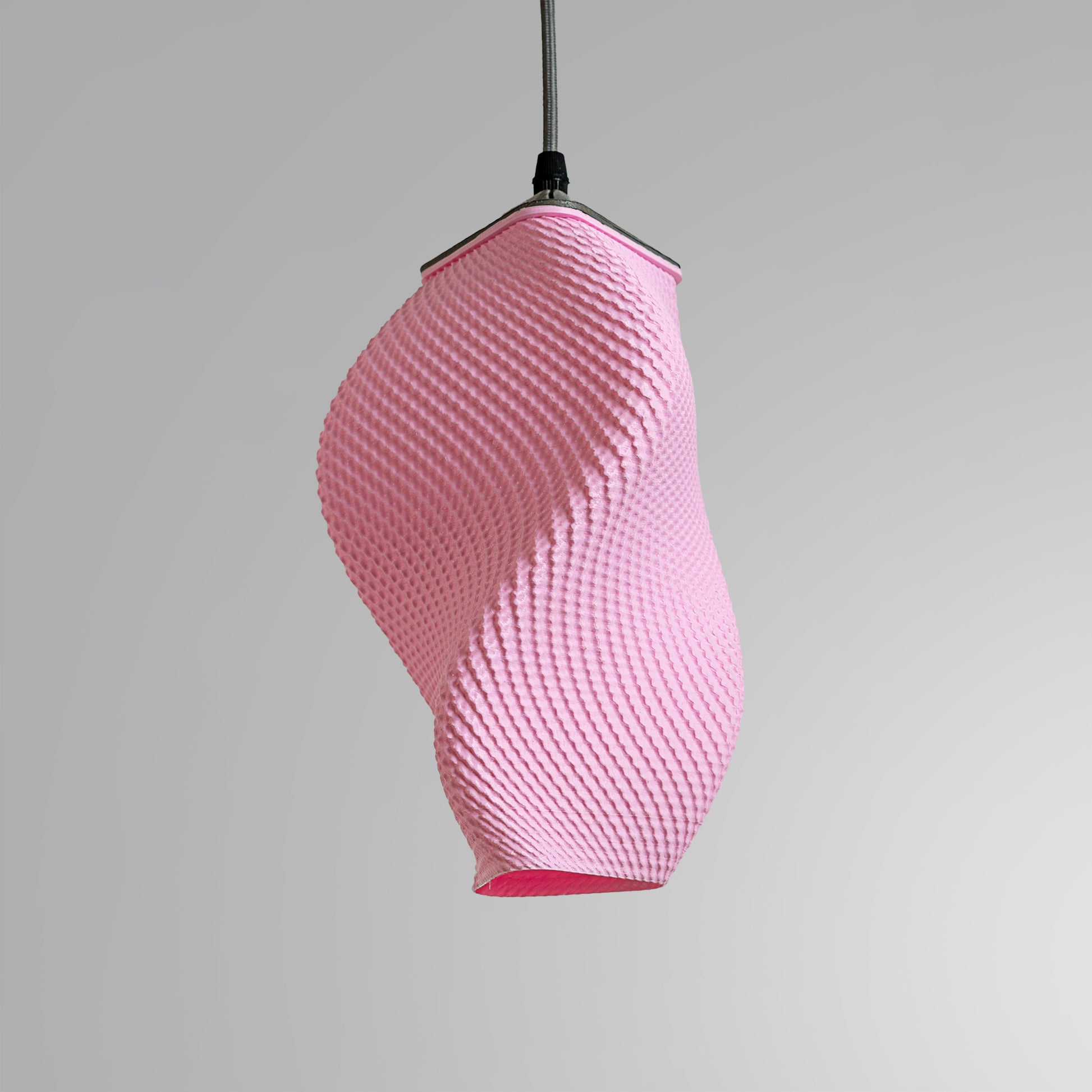 Sozori contemporary pastel accent lamp in pink with a unique twisted design for modern decor