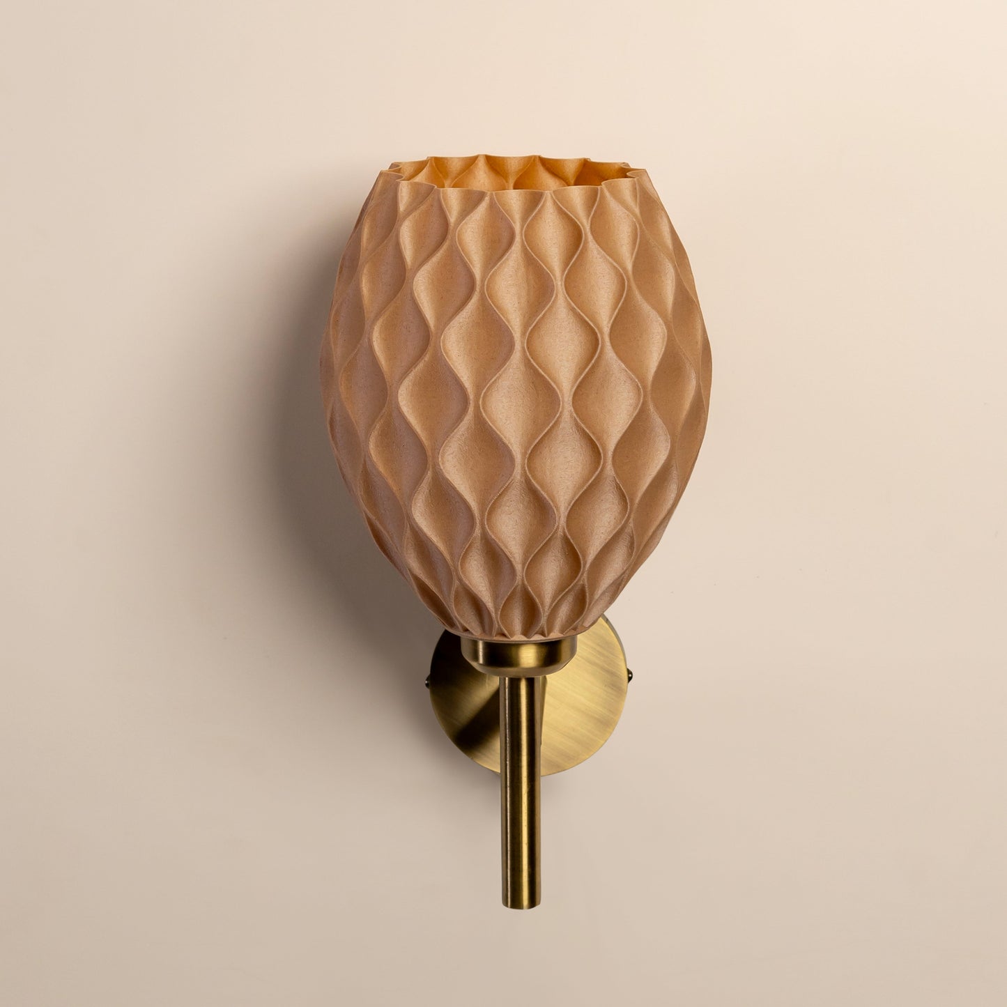 Sozori contemporary wall light for living room with a textured golden shade and elegant design