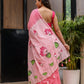 Pink cotton malmal saree with blouse featuring floral prints and tassels for a stylish look