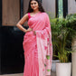 Elegant pink cotton malmal saree with blouse, featuring floral designs, perfect for festive occasions