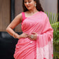 Elegant Stylera cotton malmal saree with blouse in pink, featuring floral designs and a lightweight drape
