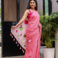 Elegant pink cotton malmal saree with blouse featuring floral prints and tassels for festive occasions