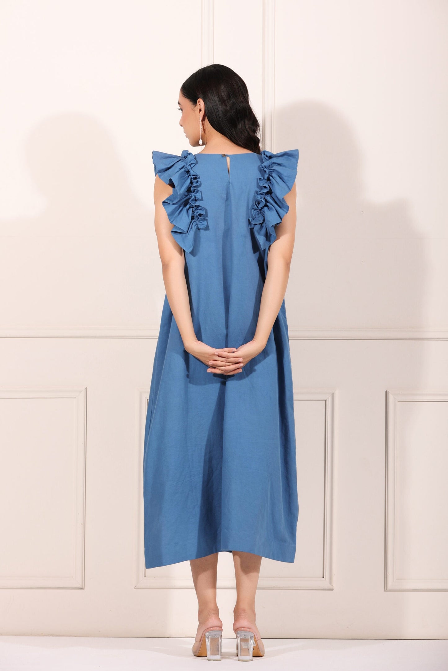 Back view of a blue cotton ruffle sleeve dress for women with elegant ruffle detailing