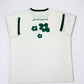 Cream oversized flower t-shirt featuring green flower graphics and a kindness message on the back