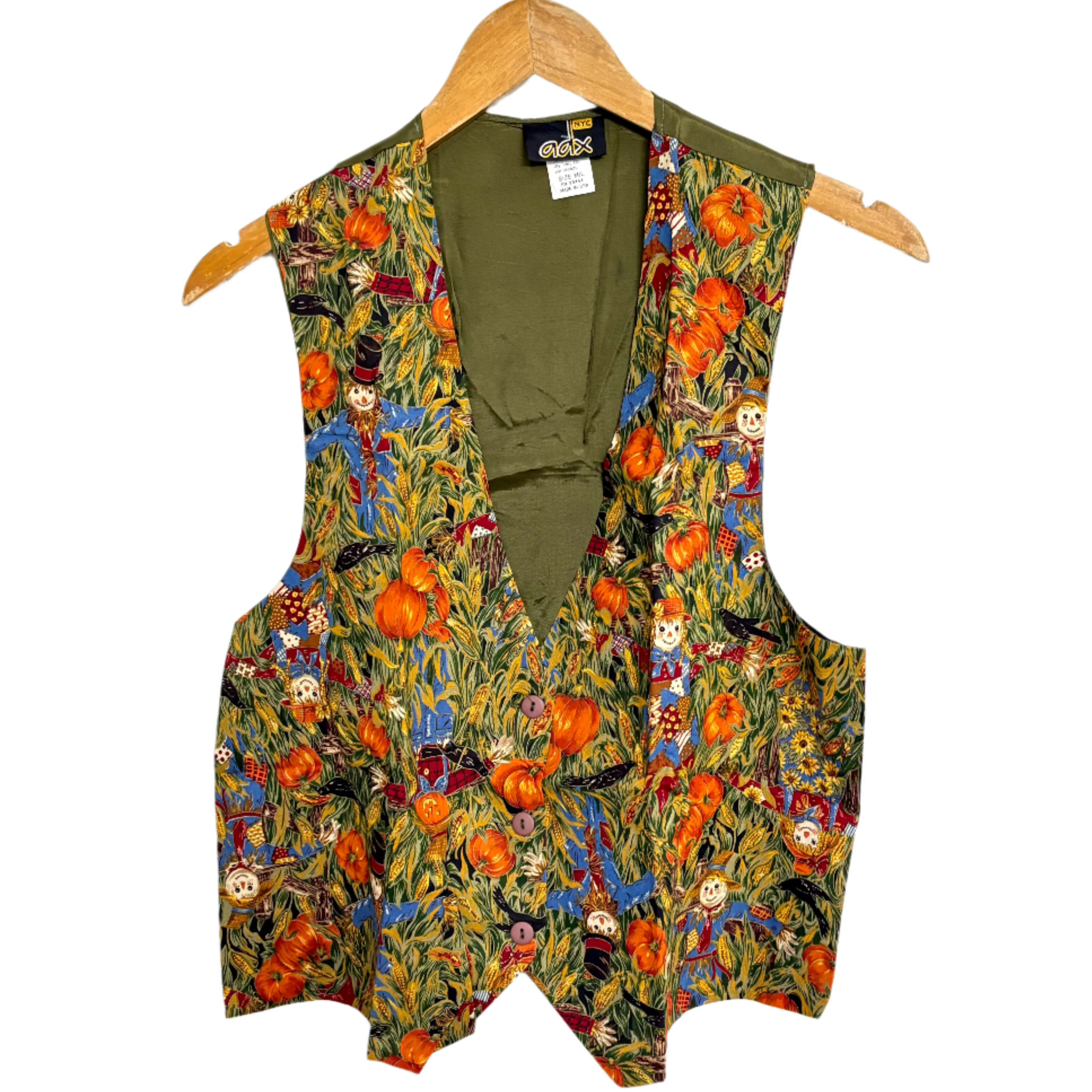 Stylera creepy chic vest with fall harvest print pumpkins scarecrows and cornstalks olive green lining