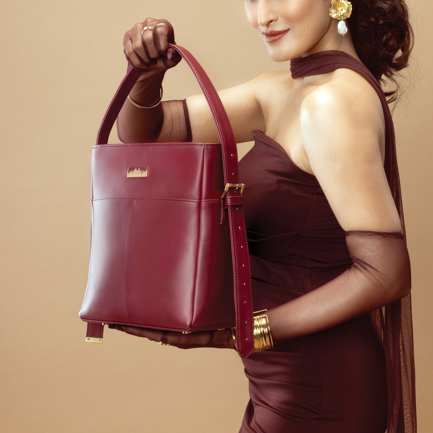 Stylish crimson bucket bag for women by Stylera, perfect for any elegant outfit