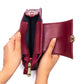 Crimson mini baguette bag open showing spacious interior and sleek design by Stylera