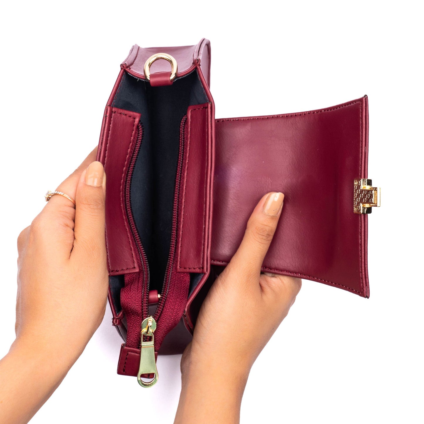 Crimson mini baguette bag open showing spacious interior and sleek design by Stylera