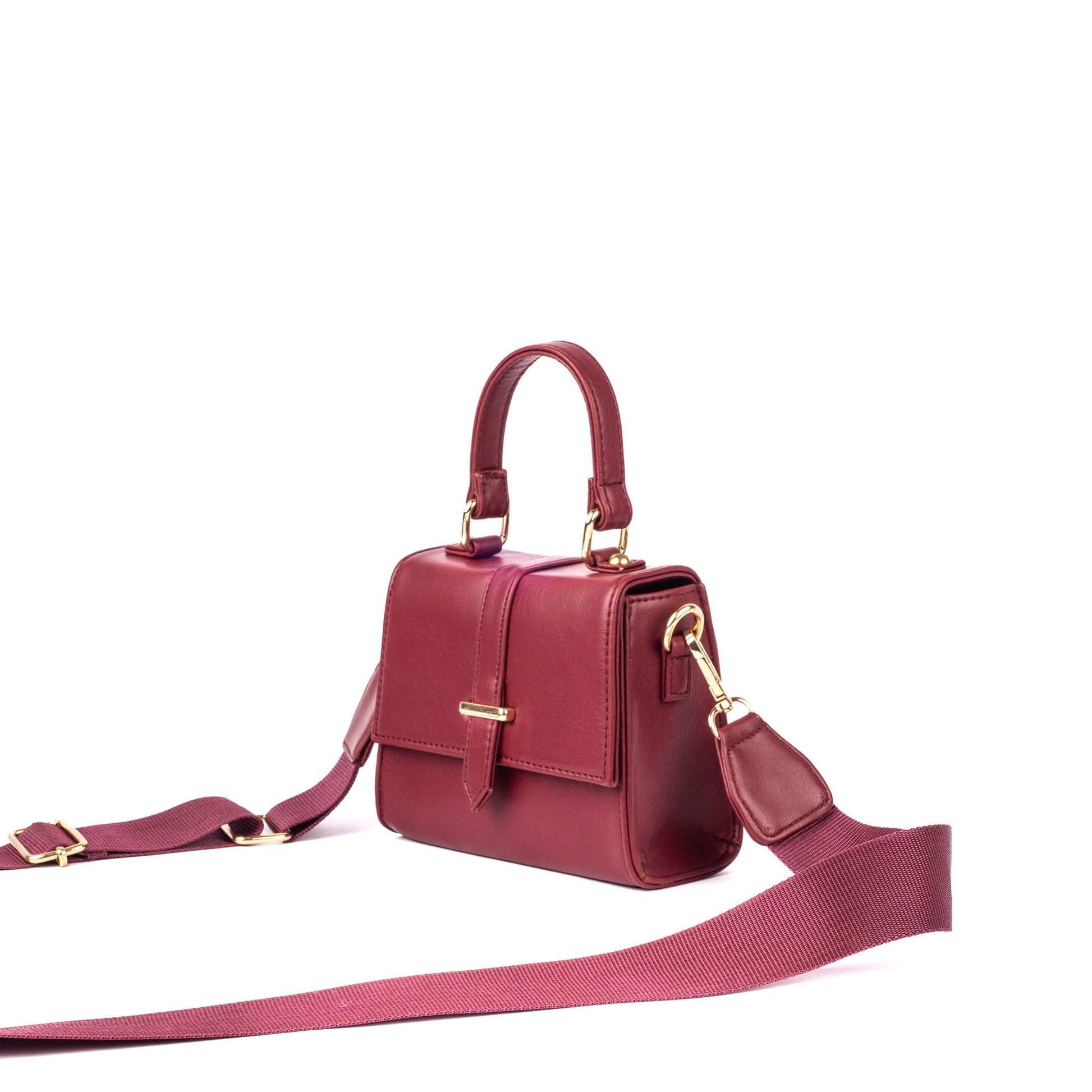 Stylish crimson mini sling bag by Stylera with a sleek design and adjustable strap