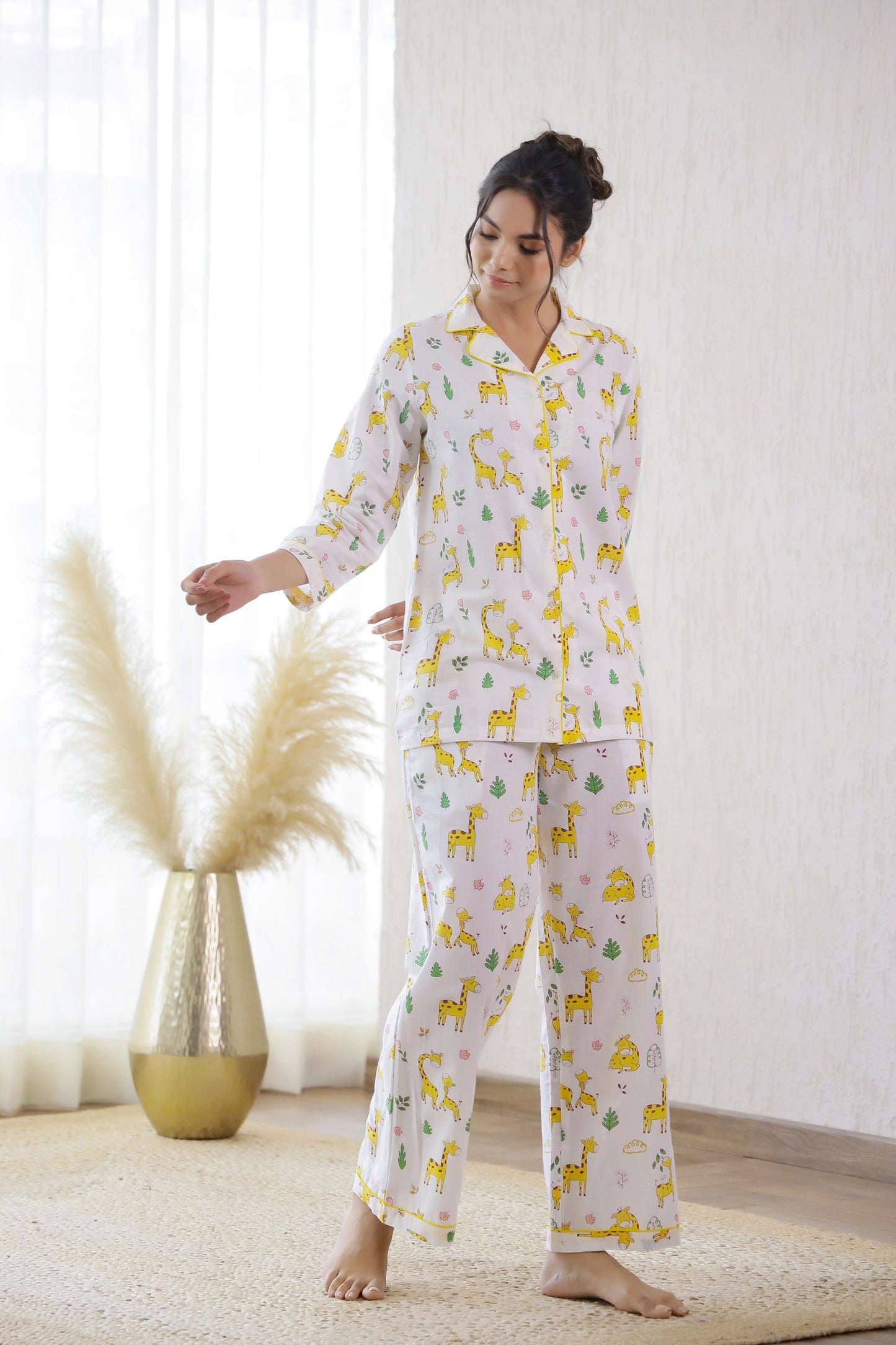 Cute animal print nightwear for women featuring a long-sleeve shirt and matching pants by Stylera