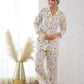 Cute animal print nightwear for women featuring a comfortable top and pants in light colors
