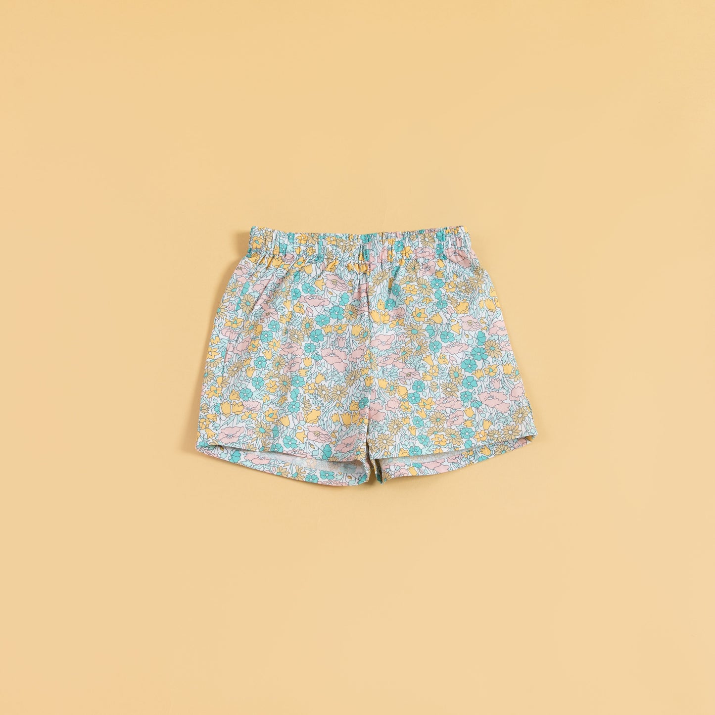 Cute floral top and shorts set featuring colorful floral patterns and comfortable elastic waistband
