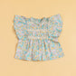 Cute floral top and shorts set featuring a ruffled, colorful design perfect for summer outfits