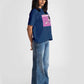 Stylera cute print blue t-shirt for women worn with light denim jeans and cap