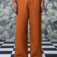 Stylera dark camel linen trousers with a straight fit and button closure