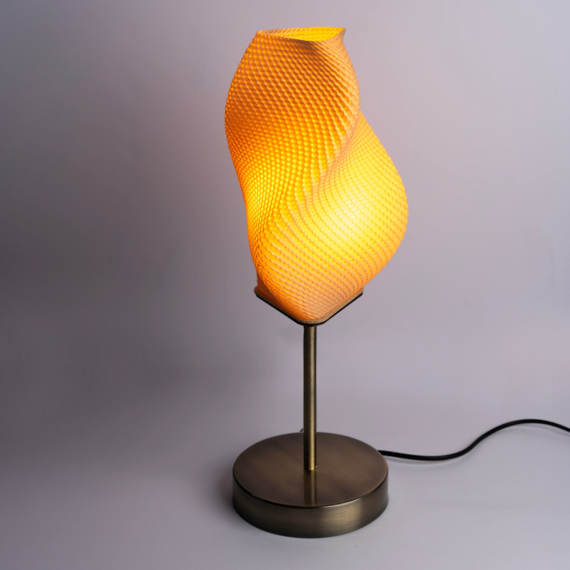 Sozori decorative bedside lamp for home with a unique swirl design and warm yellow light