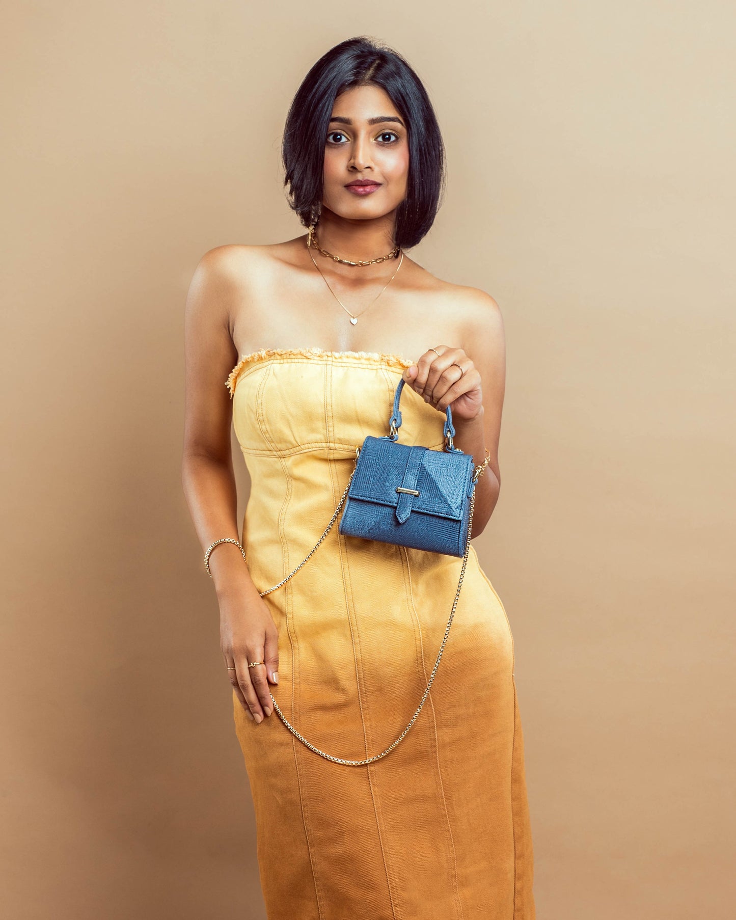 Stylish denim mini sling bag by Stylera, perfect for casual outings and trendy looks