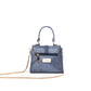 Stylish denim mini sling bag by Stylera featuring a chic design and gold accents