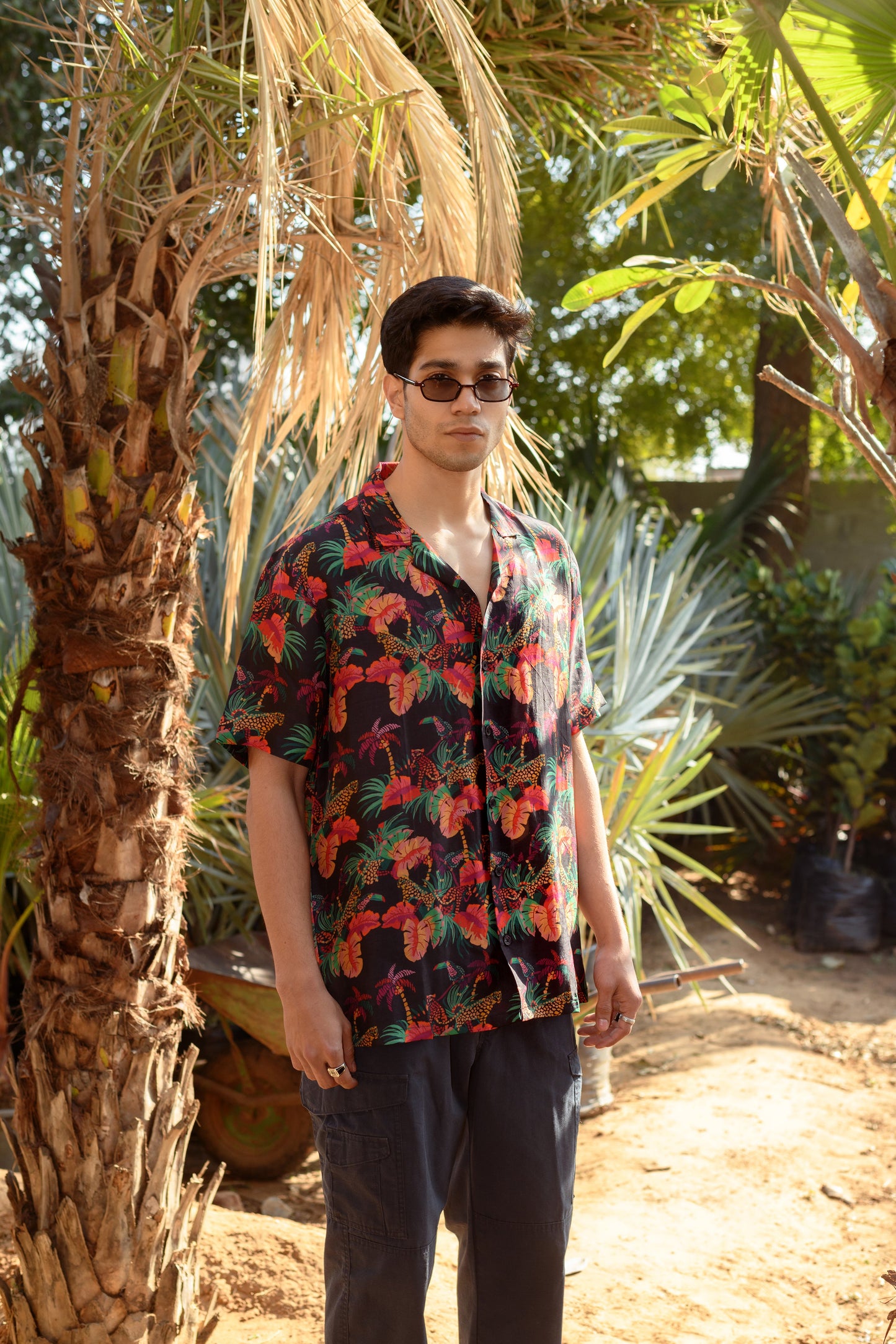 Stylera designer animal print shirt for men in vibrant tropical colors, perfect for casual outings or summer events