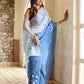 Elegant designer blue saree for women with floral embroidery showcasing a stylish drape
