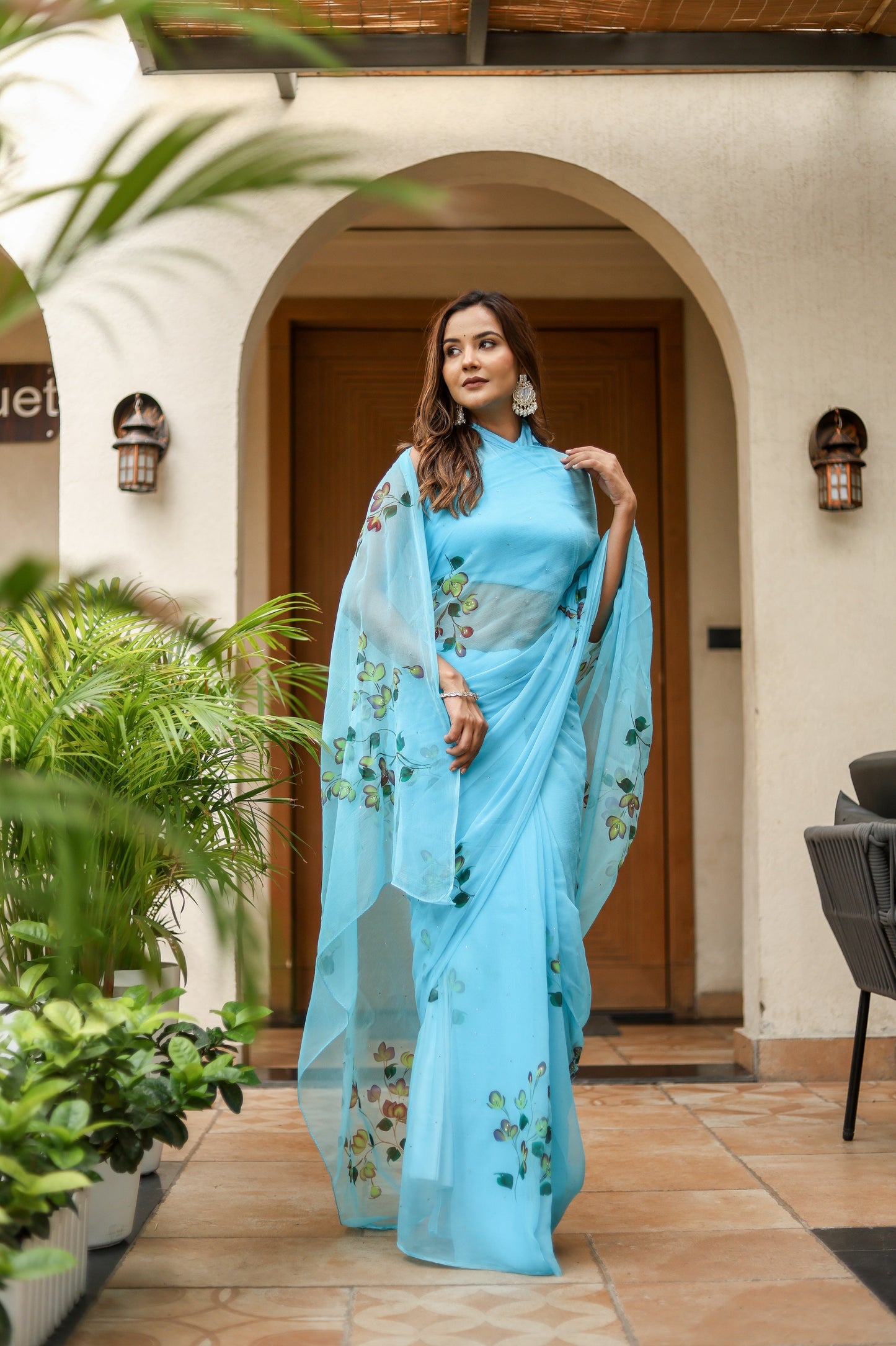Elegant designer blue saree for women with floral embroidery, perfect for festive occasions