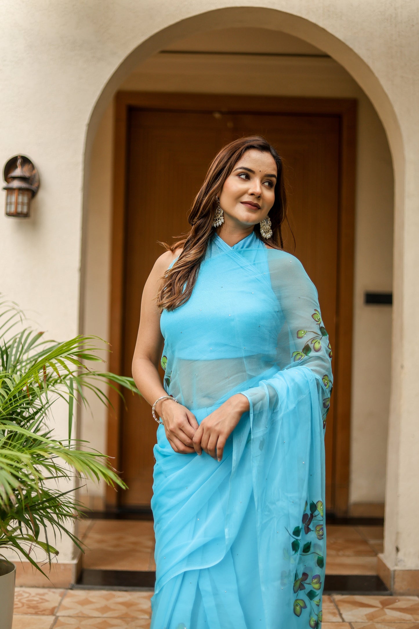 Elegant designer blue saree for women with intricate embroidery, perfect for special occasions.