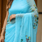 Elegant designer blue saree for women with floral prints and delicate embellishments