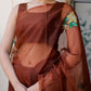 Elegant designer brown saree for wedding with floral embroidery and sheer fabric details