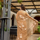 Elegant designer brown saree for women featuring floral designs and a lightweight fabric for a graceful look