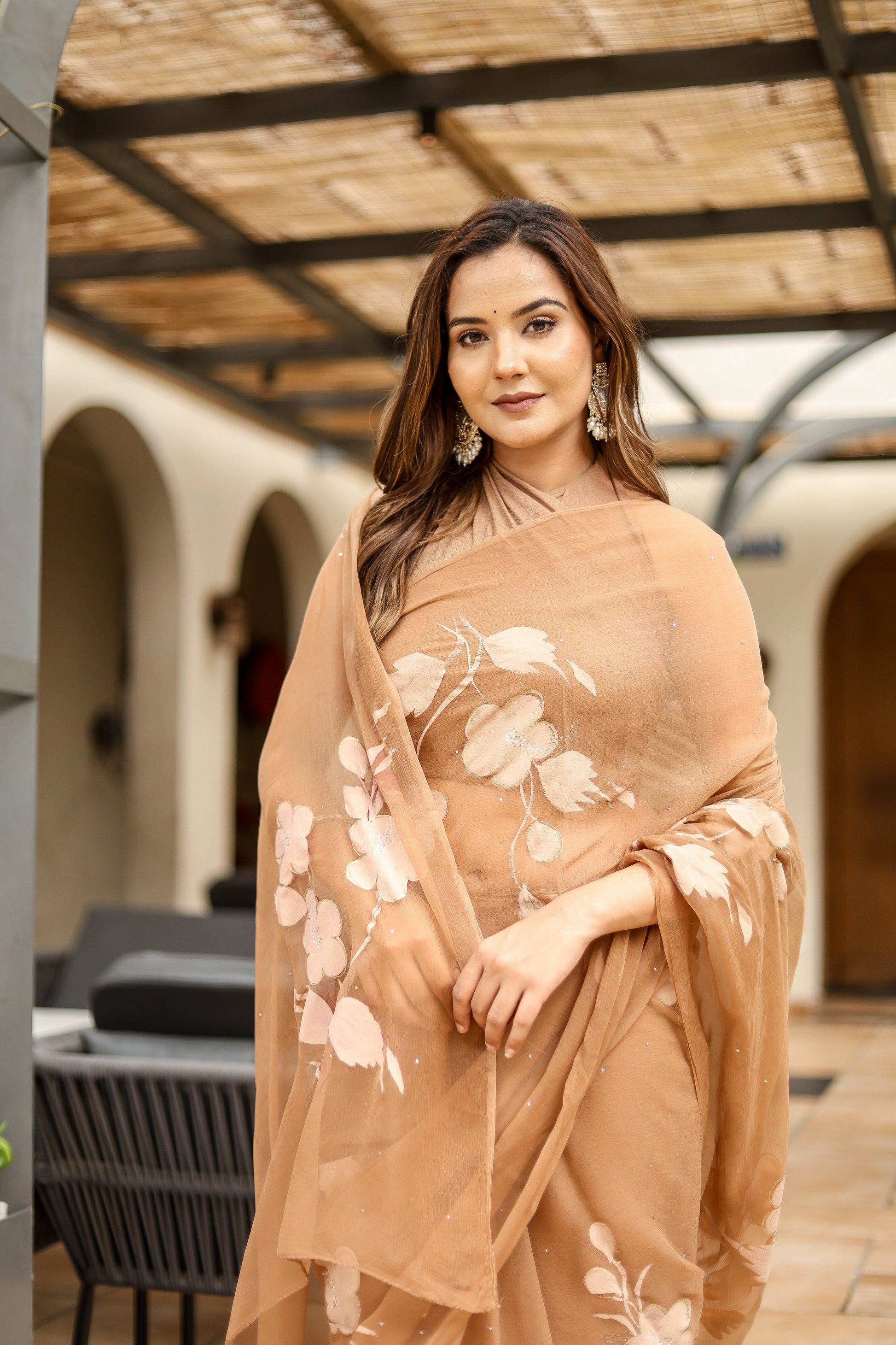 Elegant designer brown saree for women with floral embroidery, perfect for formal occasions