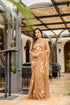 Designer brown saree for women with delicate floral patterns, perfect for elegant occasions