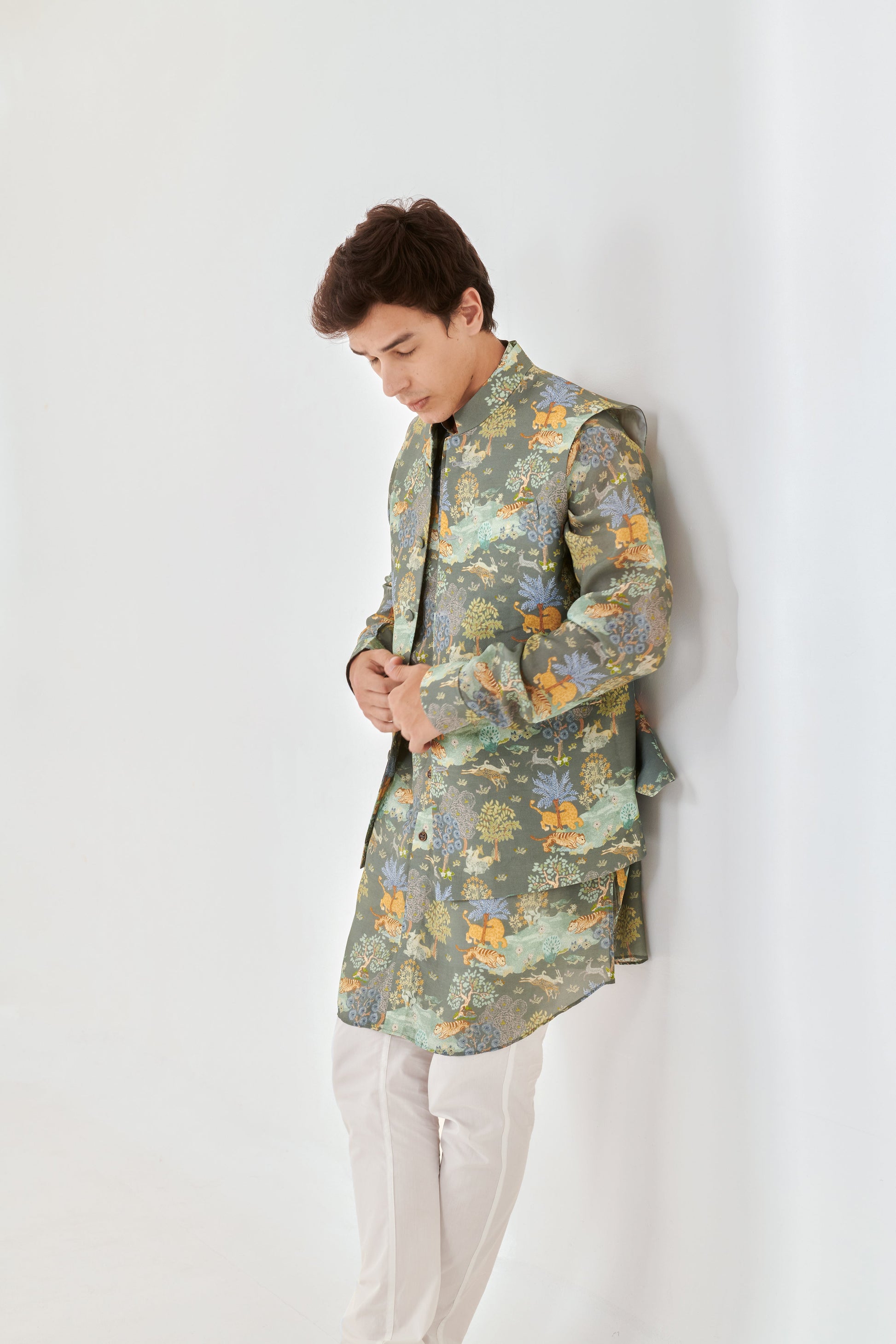 Stylish Stylera designer ethnic kurta bandi for men with floral patterns in green and yellow, paired with light trousers