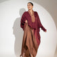 Elegant designer evening gown for women in burgundy and bronze, perfect for formal occasions