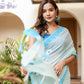 Stylera designer handpainted saree for parties in soft blue hues with elegant flow and detailing
