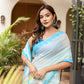 Elegant Stylera designer handpainted saree for parties in soft blue shades with floral details
