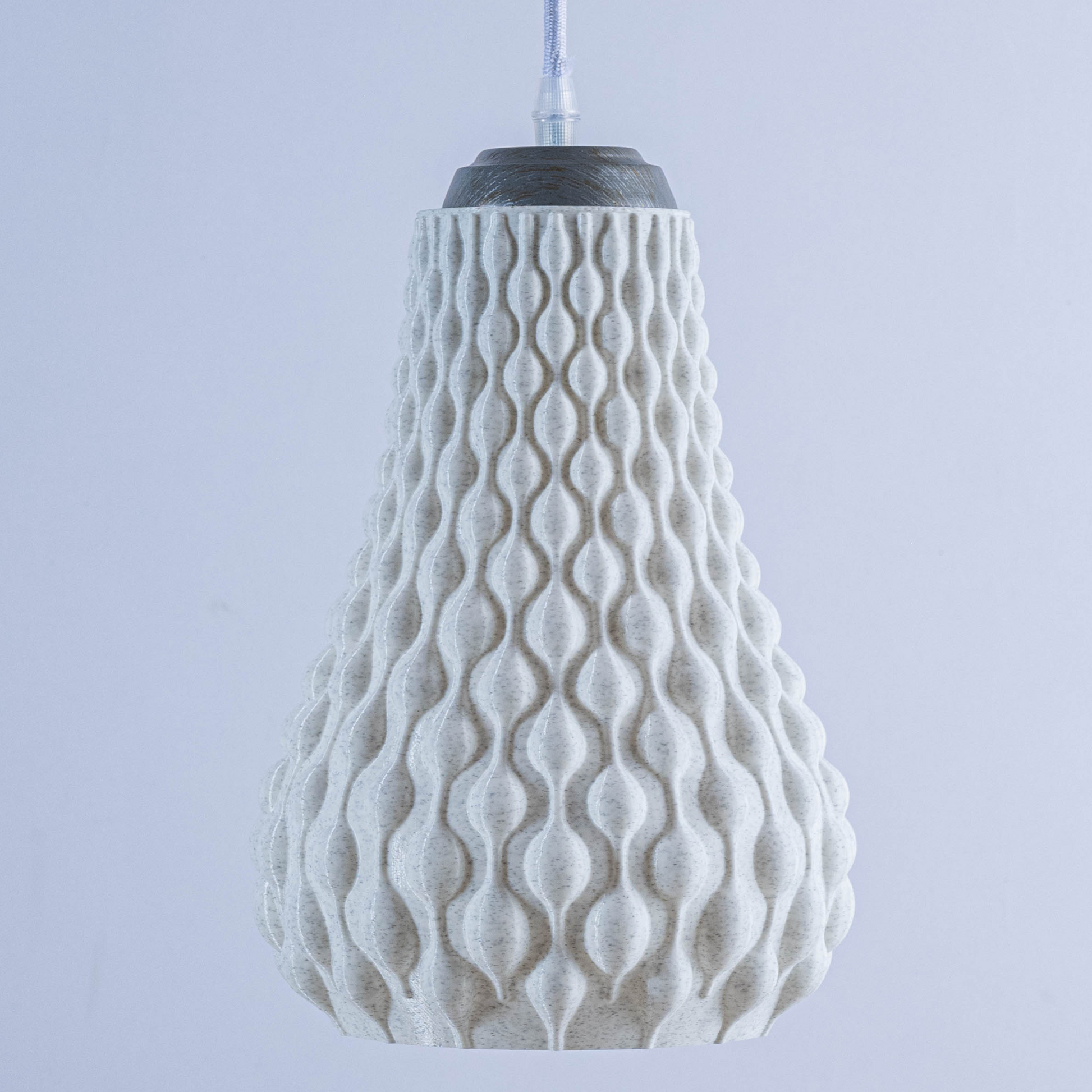 Sozori designer hanging droplet lamp with textured design and elegant shape for modern decor