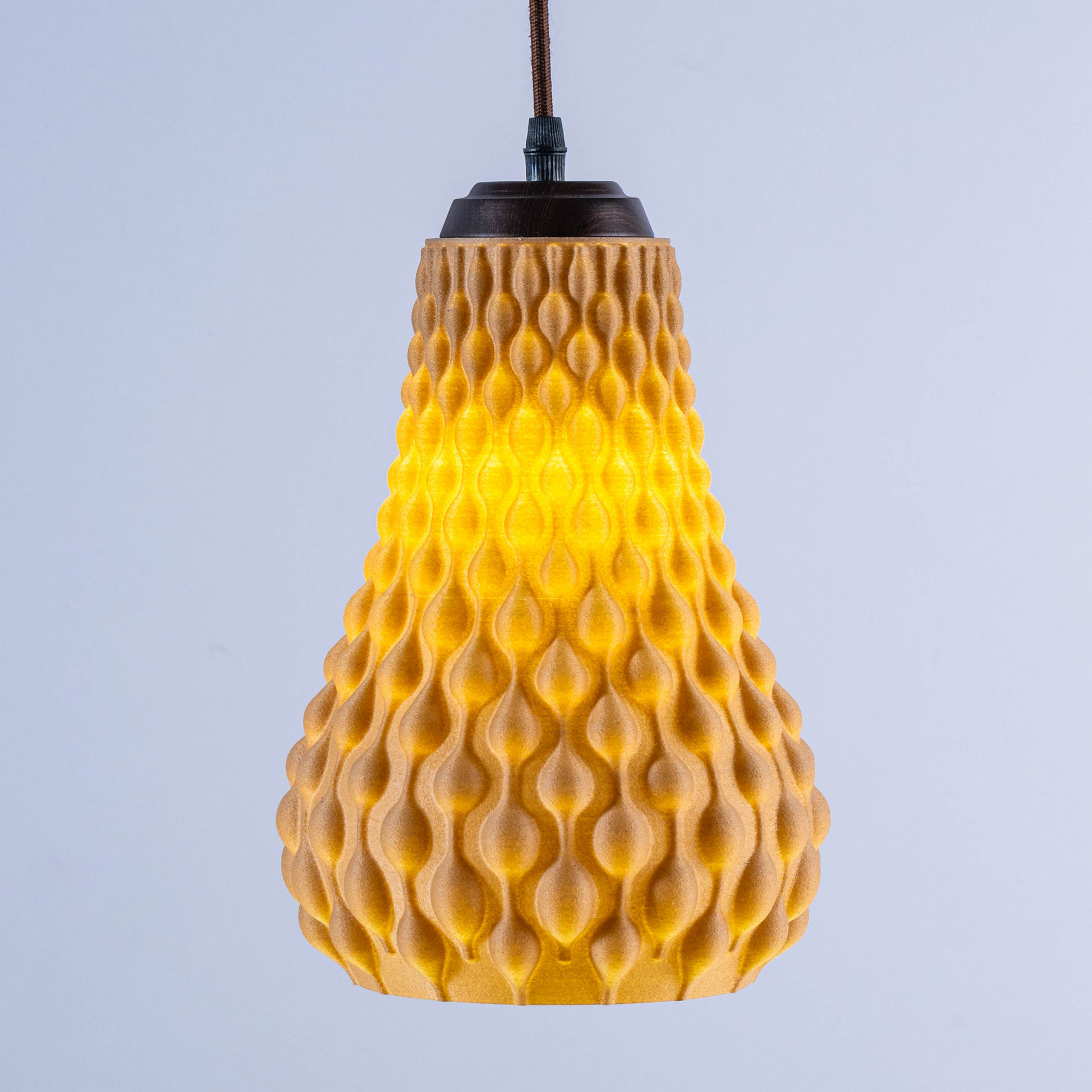 Sozori designer hanging droplet lamp in yellow with a textured finish for modern décor