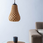Sozori designer hanging droplet lamp in unique textured design illuminating a cozy living space