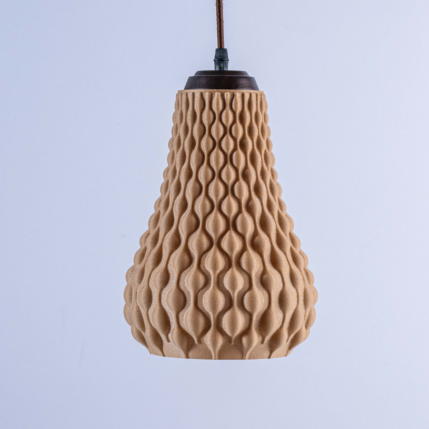 Sozori designer hanging droplet lamp with a unique textured surface in warm beige color