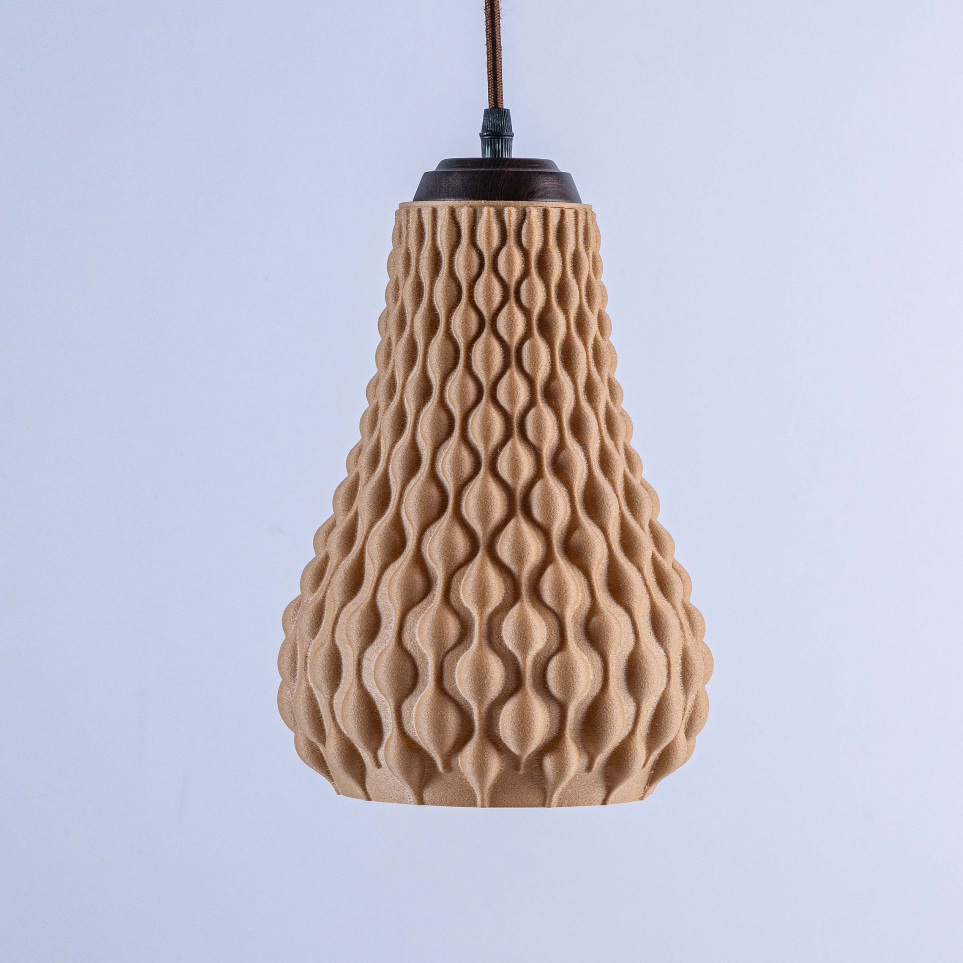 Sozori designer hanging droplet lamp with a unique textured surface in warm beige color