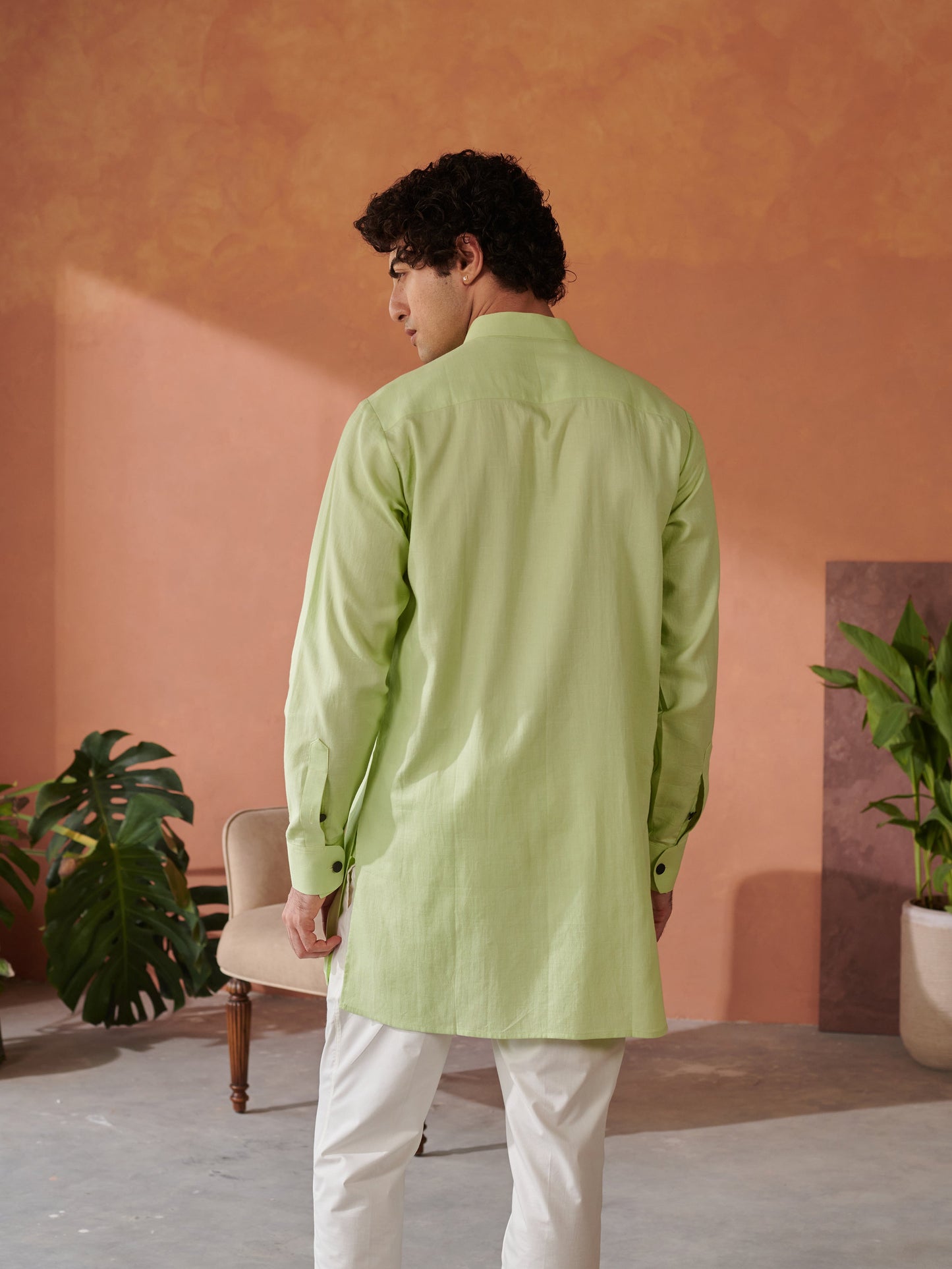 Back view of a light green designer kurta for men by Stylera 