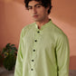 Stylera designer kurta for men in light green with stylish black buttons and a classic collar