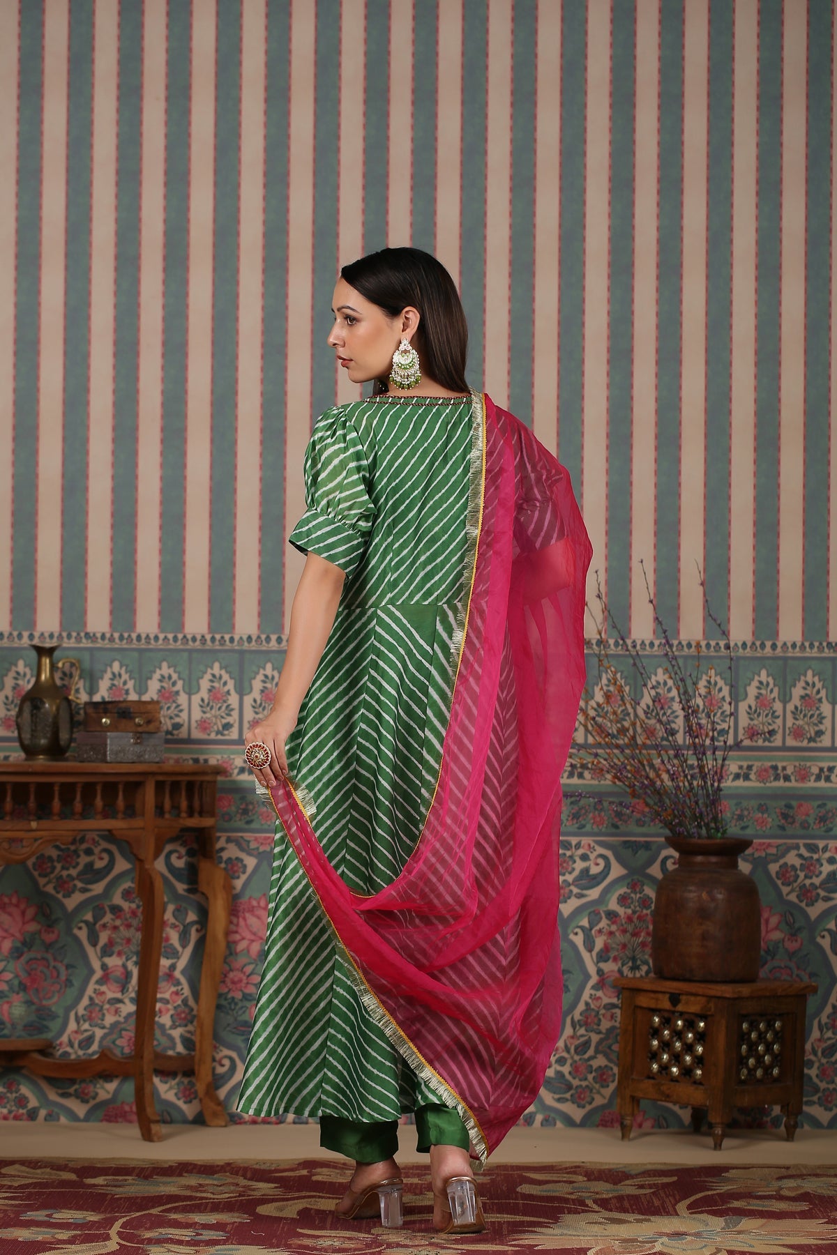 Stylish designer lehriya dress for women in green with a pink dupatta for festive occasions