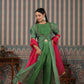 Elegant green designer lehriya dress for women with contrasting pink dupatta and stylish detailing