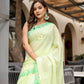 Stylera designer malmal saree with flowers in soft green featuring elegant floral embroidery