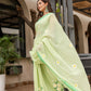Stylera designer malmal saree with flowers in light green, featuring delicate floral embroidery